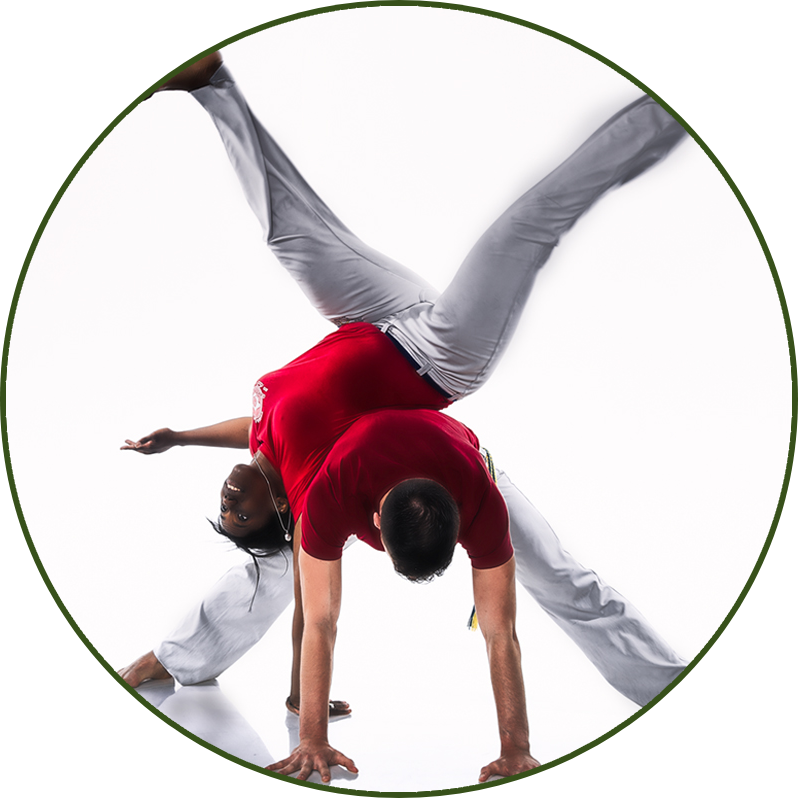 Image of 2 Capoeiristas doing a movement together